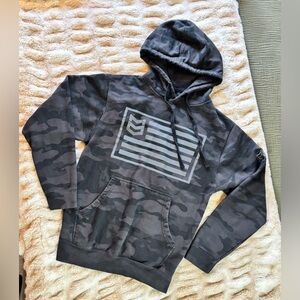 MTN OPS - Black Camo Pullover Hoodie with Subtle Flag Graphic